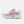 Pink running shoe with white sole on a light gray background