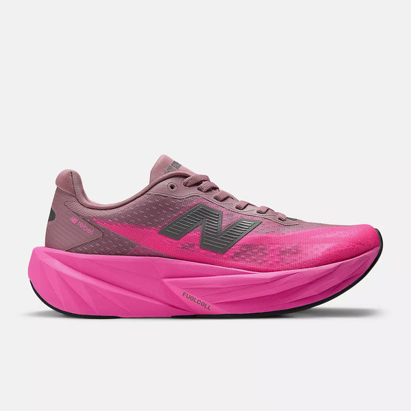 Pink and purple New Balance running shoe on a white background.