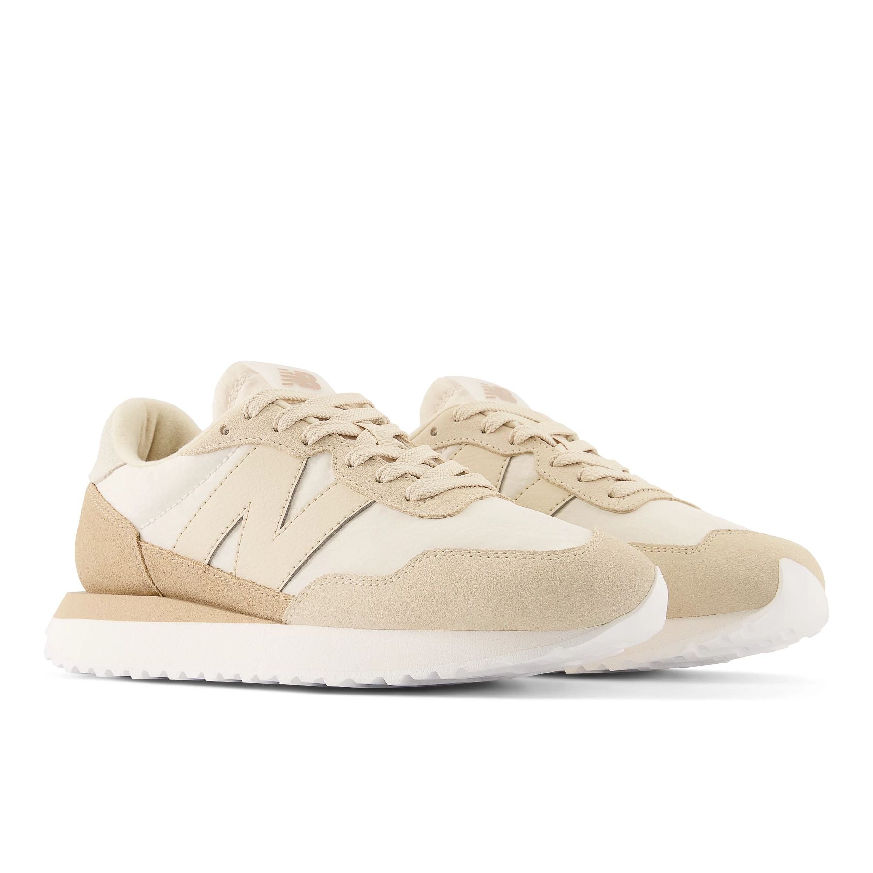Front angle view of the Women's New Balance lifestyle 237 shoe in Beige