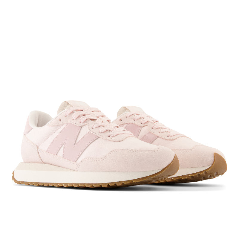 This NB 237 has very soft colors in the upper adn a gum sole rubber