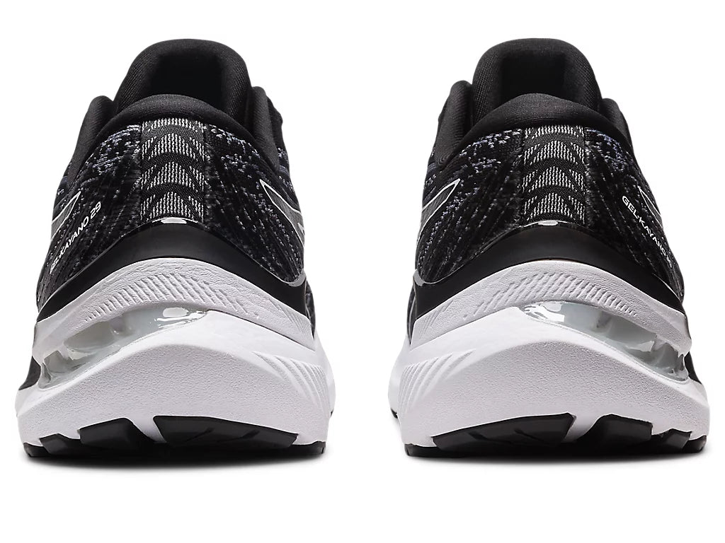 Back view of the Men's ASICS Gel Kayano 29 in the wide "4E" width in Black/White