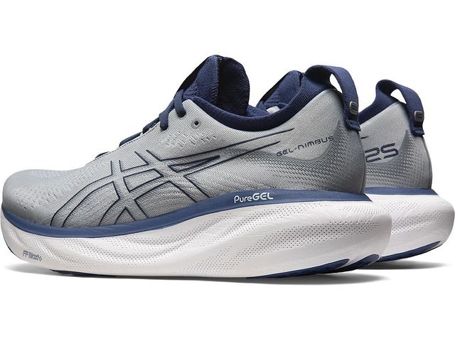 Back angled view of the Men's Nimbus 25 by ASIC in the color Sheet Rock/Indigo Blue