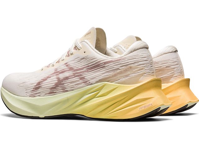 Back angled view of the Women's Nova Blast 3 by ASIC in the color Cream/Fawn