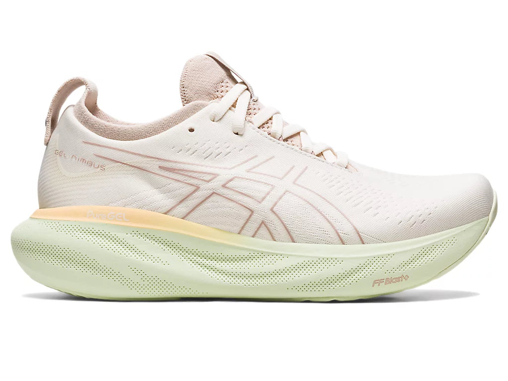 Lateral view of the Women's ASICS Nimbus 25 in the color Cream/Fawn