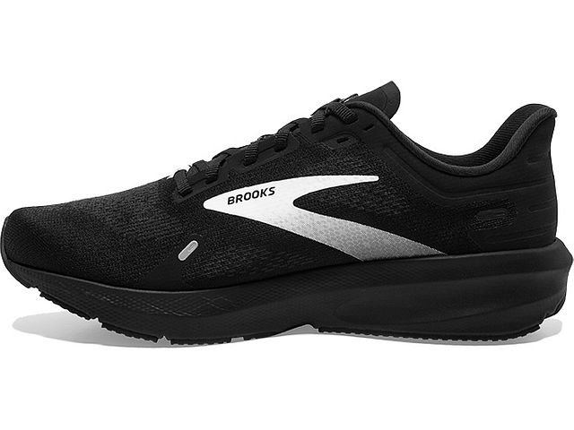 Medial view of the Men's Launch 9 by Brooks in the wide 2E width, color Black/White