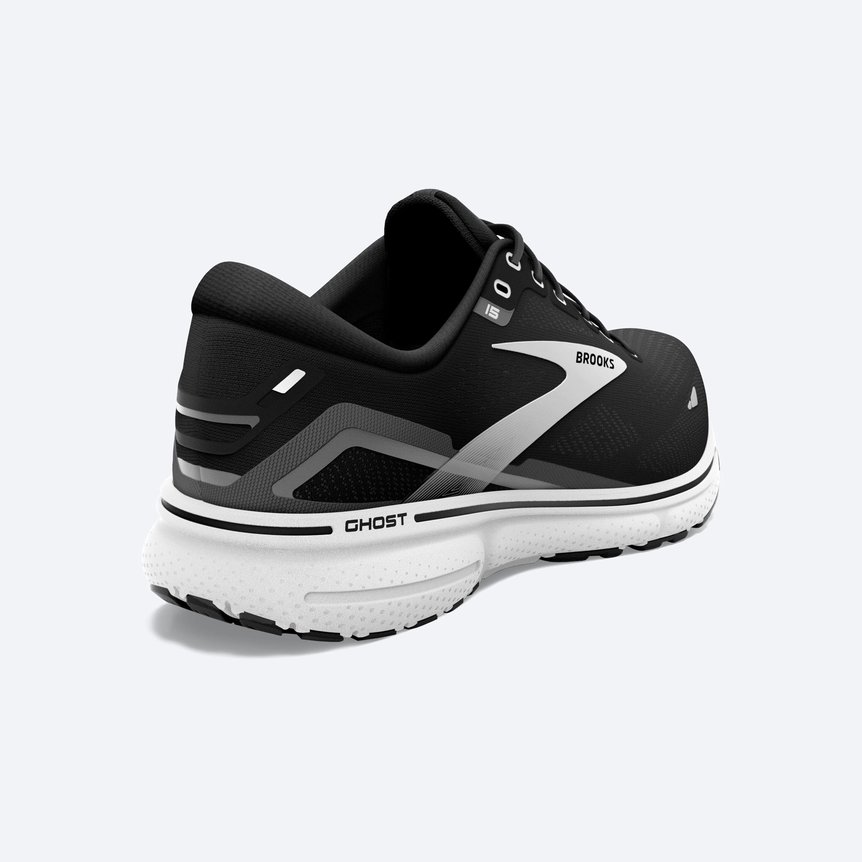 Back angle view of the Women's Ghost 15 by Brooks in the wide D width, color Black/BlackenedPearl/White