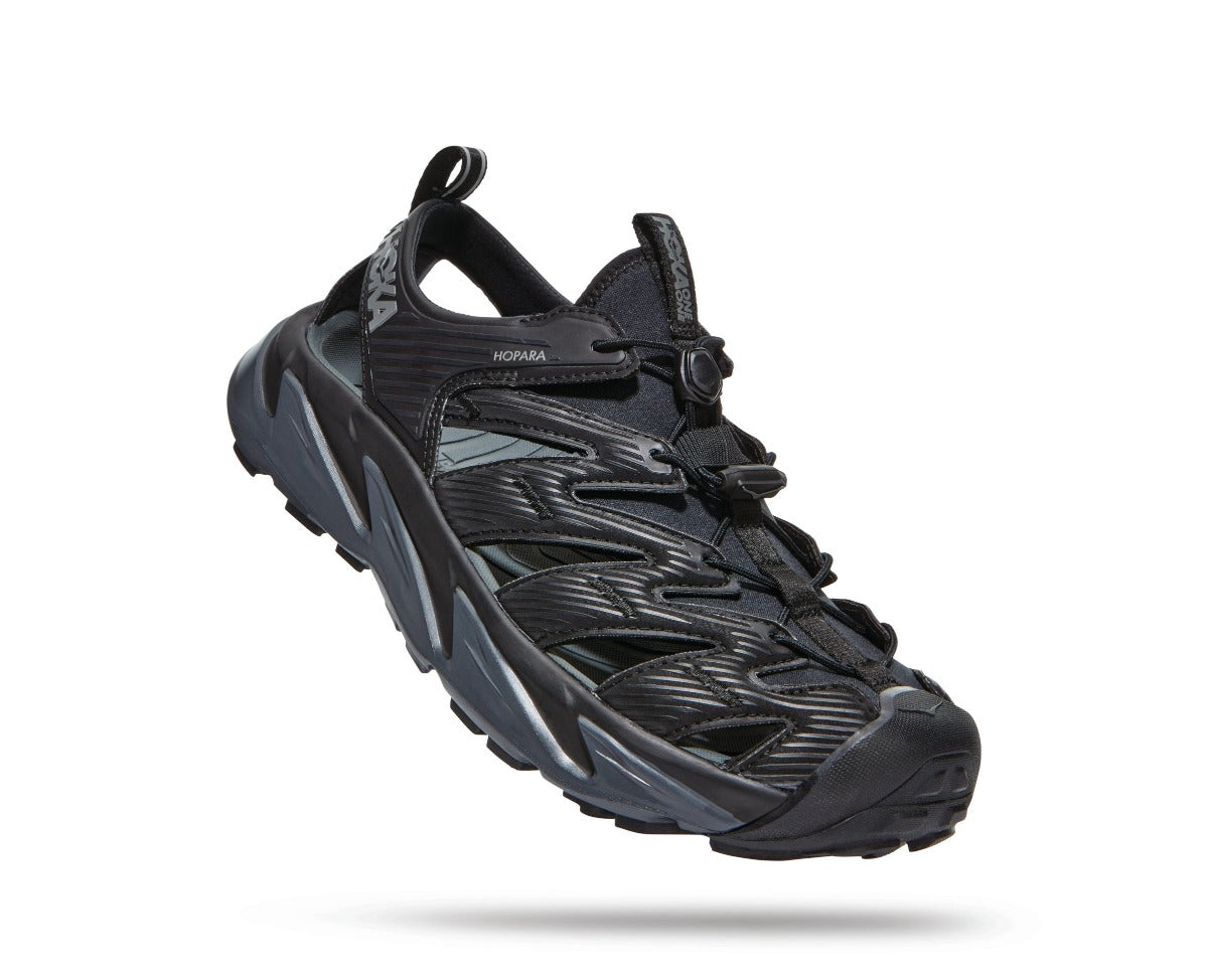 Lateral angled view of the Men's Hopara sandal by HOKA in Black