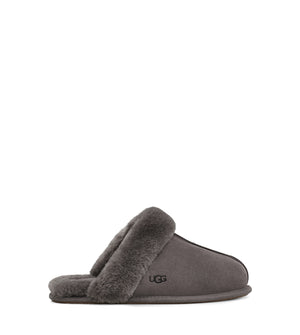 The Women's Ugg Scuffette 2 is an essential house slipper cast in soft suede with plush wool lining. Pair with our cozy robes or matching cashmere sets for maximal leisure.  This is the Thunder Cloud color.