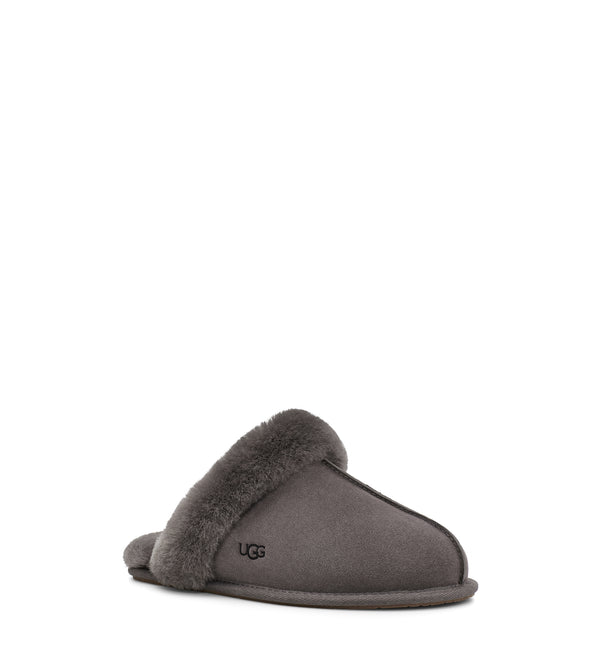 The Women's Ugg Scuffette 2 is an essential house slipper cast in soft suede with plush wool lining. Pair with our cozy robes or matching cashmere sets for maximal leisure.  This is the Thunder Cloud color.