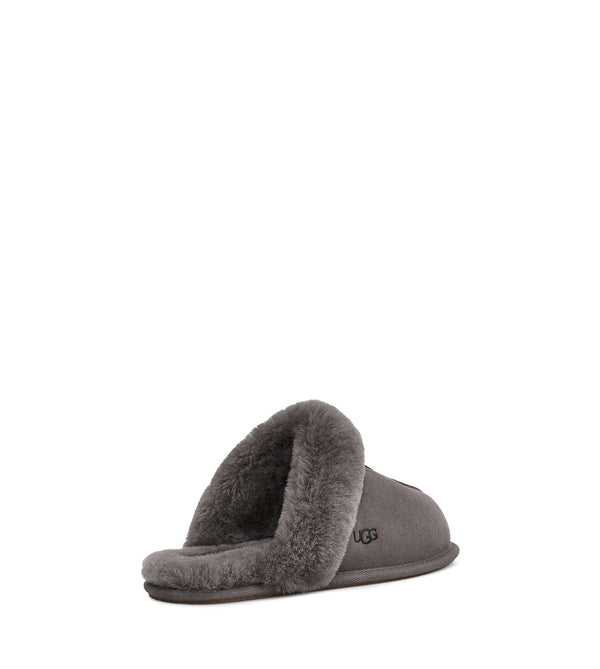 The Women's Ugg Scuffette 2 is an essential house slipper cast in soft suede with plush wool lining. Pair with our cozy robes or matching cashmere sets for maximal leisure.  This is the Thunder Cloud color.
