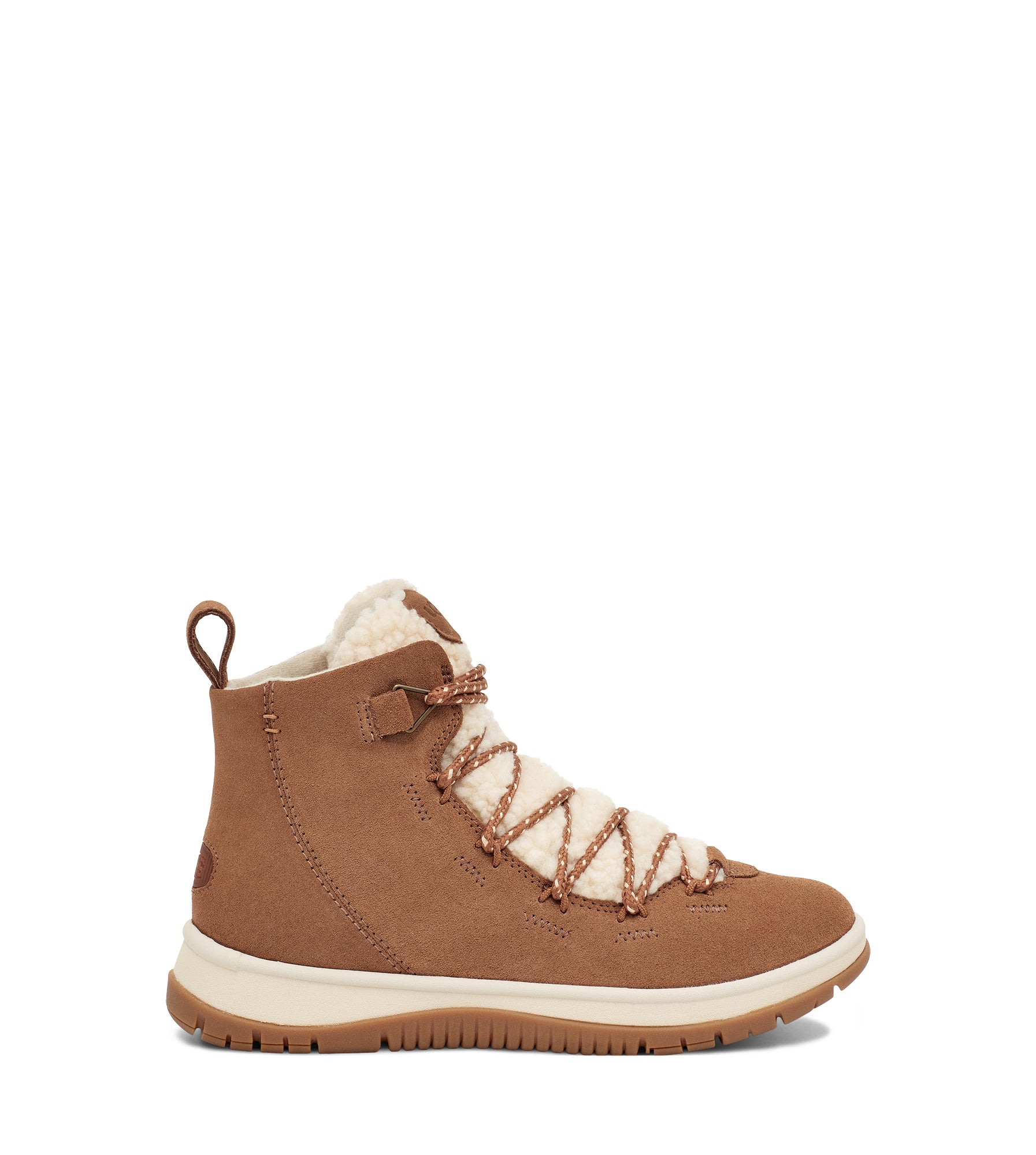A sneaker-boot hybrid featuring timeless heritage details, seam-sealed waterproof suede, and a cozy plush wool blend, the Women's Ugg Lakesider easily stands out. One of the highlights is the curly UGG sheepskin along the tongue. Lined in Ugg's softest fleece with a White Spider Rubber sole for enhanced traction in dry, wet, and icy conditions, this lace-up statement silhouette pairs with all your favorite winter looks.