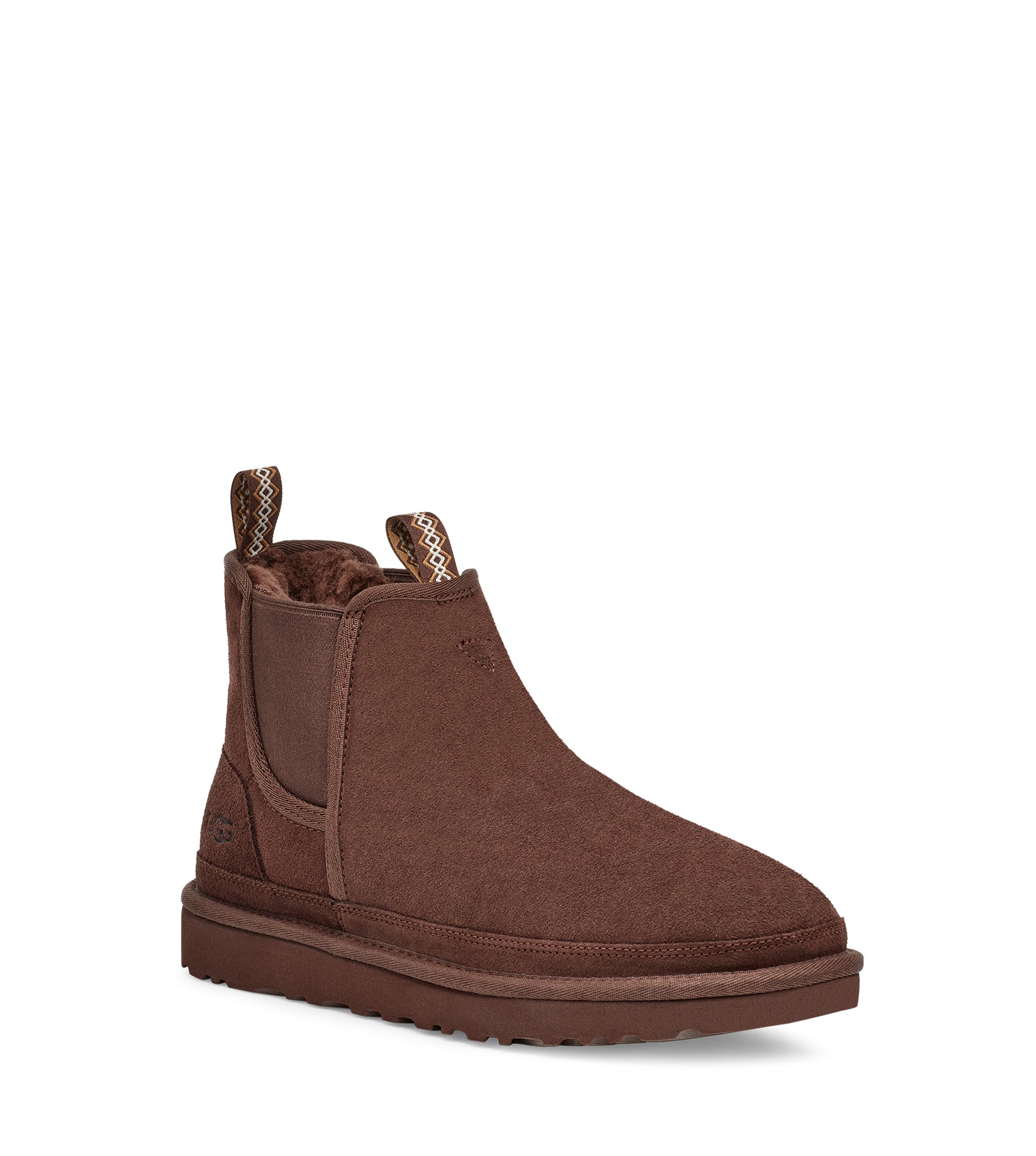 The Men's Neumel Chelsea from Ugg combines premium materials and effortless style. Made of rich suede, it's lined in a wool blend and finished with a durable Treadlite by UGG sole offering lightweight comfort and a flexible feel wherever you go.