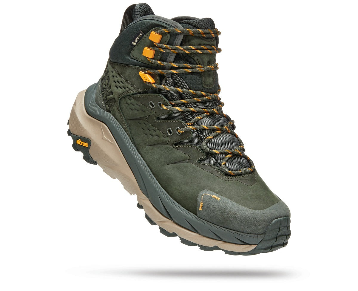 Lateral angled view of the Men's HOKA Kaha 2 Gore-Tex hiking shoe in the color Duffel Bag / Radiant Yellow