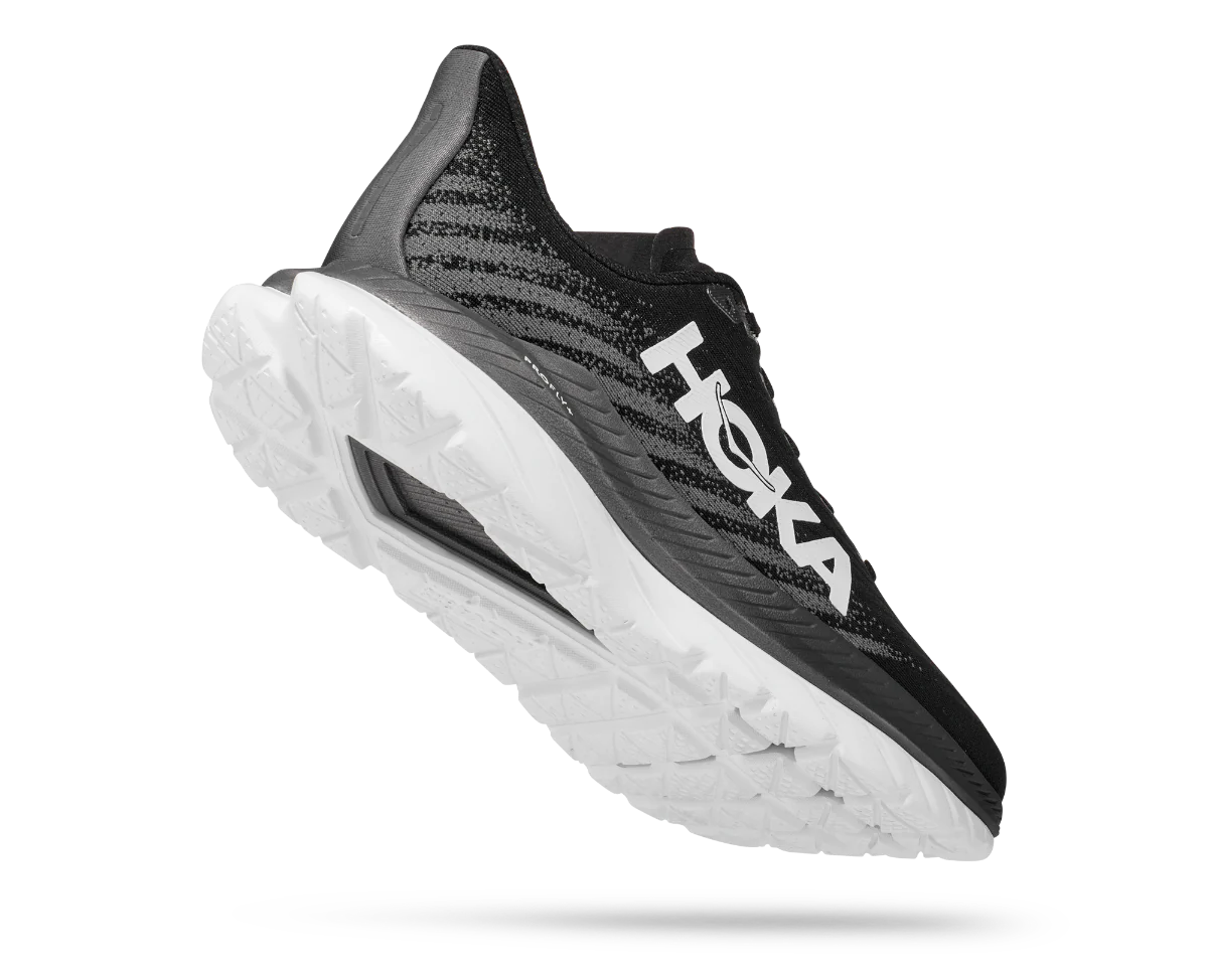 Back angled view of the Women's HOKA Mach 5 in the wide "D" width, color Black/Castlerock