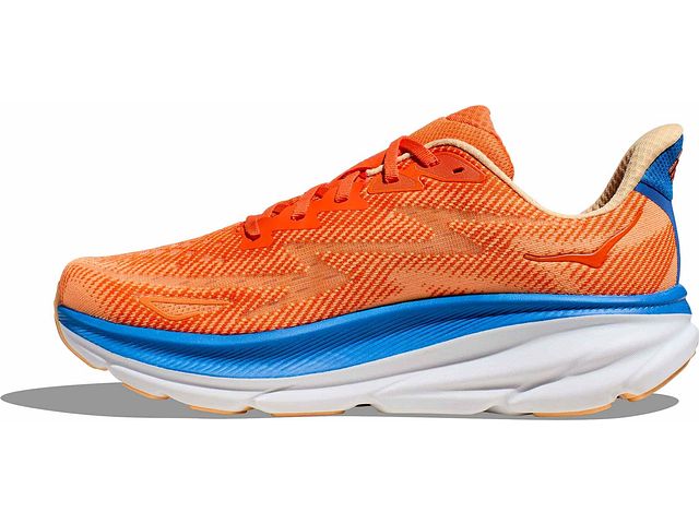 Medial view of the Men's HOKA Clifton 9 in the wide "2E" width, color Vibrant Orange/Impala