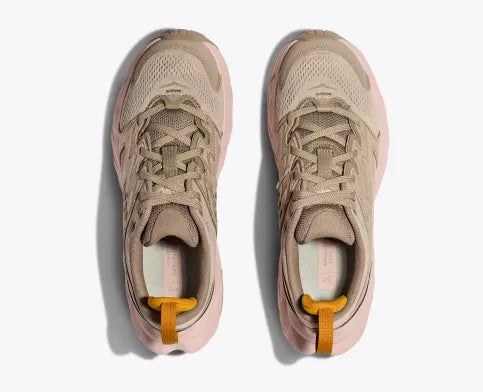 Top view of the Women's HOKA Anacapa Breeze Low trail shoe in the color Oxford Tan / Peach Whip
