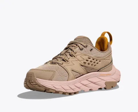Front angled view of the Women's HOKA Anacapa Breeze Low trail shoe in the color Oxford Tan / Peach Whip
