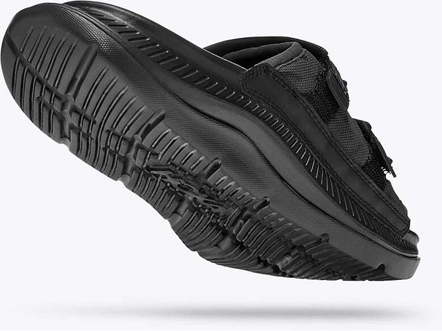 Back angled view of the Unisex Ora Luxe Recovery Slide by HOKA in all black