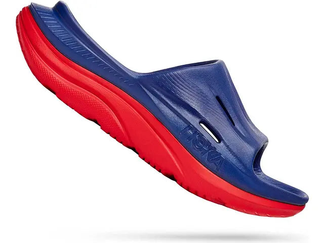 Lateral view of the Men's Ora Recovery Slide 3 by HOKA in the color Bellwether Blue/Red