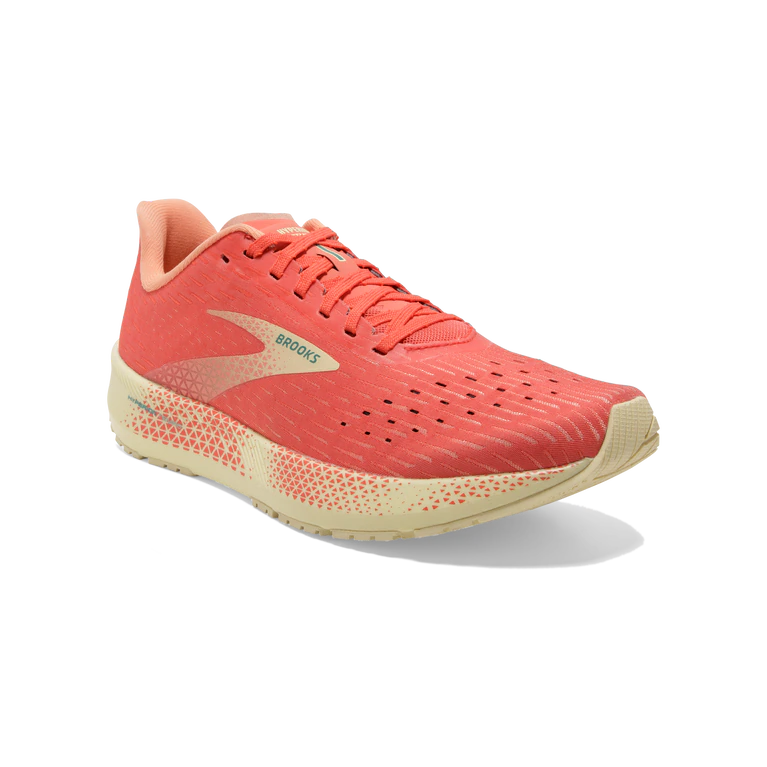 Front angled view of the Women's Hyperion Tempo by Brooks in the color Hot Coral/Flan/Fusion Coral