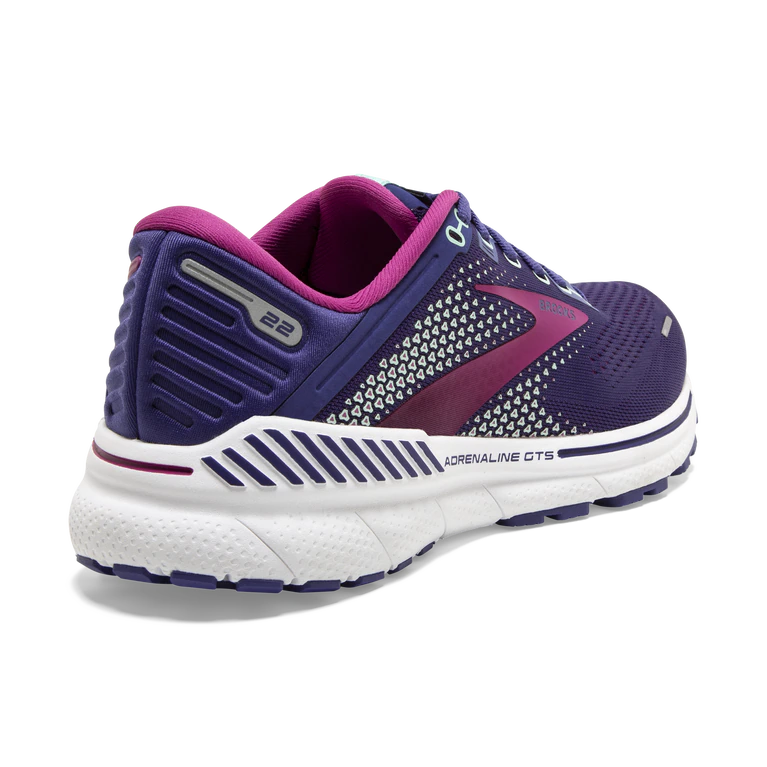 Back angled view of the Women's Adrenaline GTS 22 by Brooks in the color Navy/Yucca/Pink