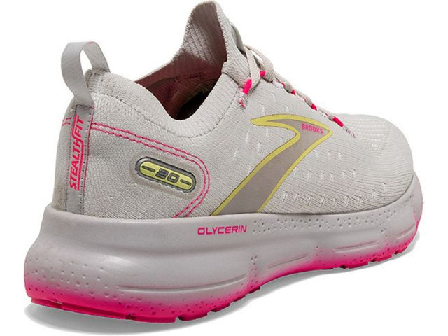 Back angled view of the Women's Glycerin Stealthfit 20 by Brooks in the color Grey/Yellow/Pink