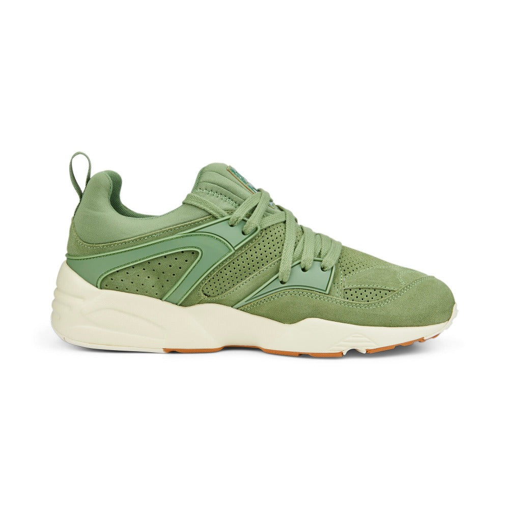 Back in 2006, PUMA launched the OG Blaze of Glory sneaker as part of the Trinomic running family. It had plush materials, a unique lacing pattern, and a trio of performance benefits from the standout Trinomic tech. Puma's Blaze of Glory MMQ sneakers are crafted of perforated suede. The pair features the brand's Trinomic tech, which provides a cushioned and comfortable stride.