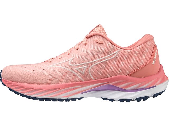Medial view of the Women's Wave Inspire 19 SSW by Mizuno in the color Peach Bud / Vaporous Grey