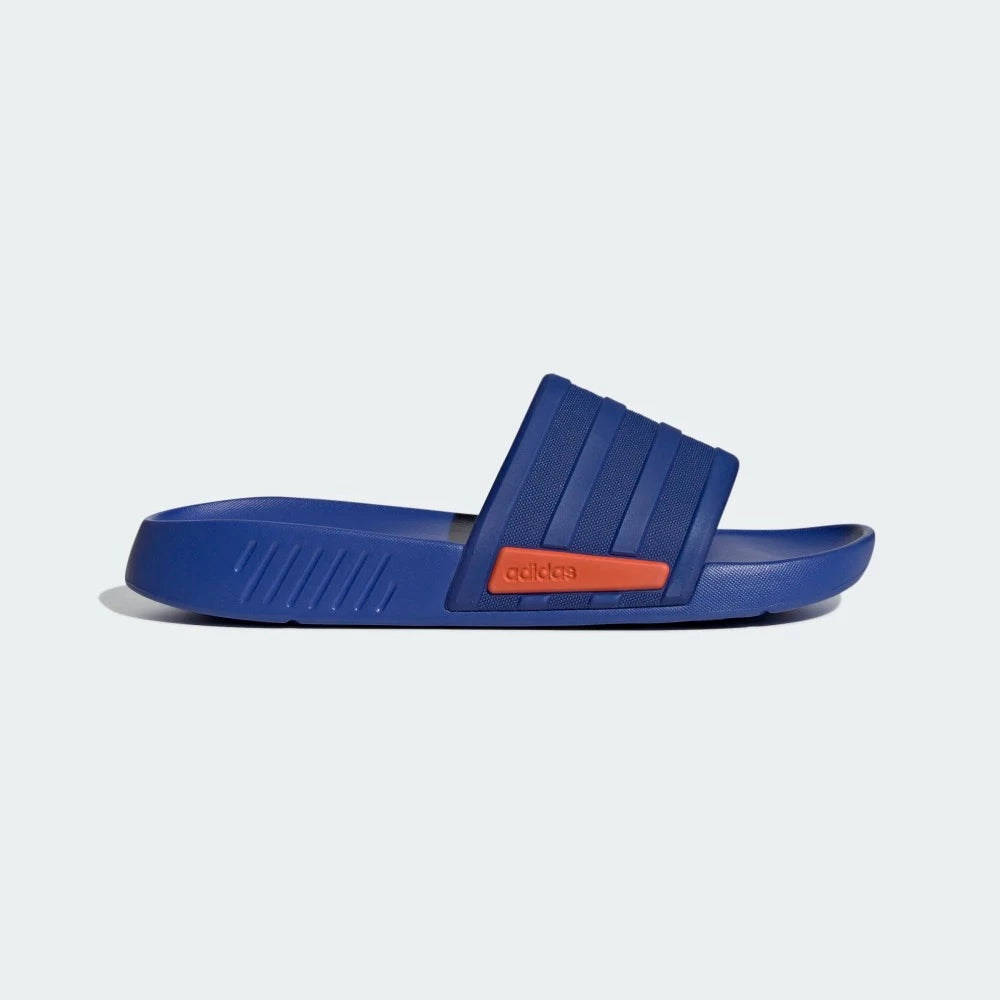 Introduced in 1972, the beloved adidas Adilette slides have been much copied but never surpassed. Designed to transition seamlessly from the beach to the locker room to running errands around town, this version has a soft EVA bandage upper and a comfortable contoured footbed.