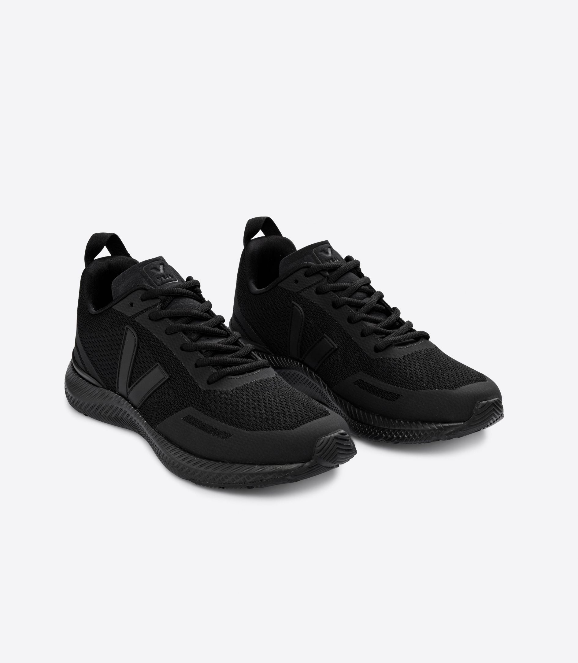 Front angle view of a pair of Women's Impala's by VEJA in all black