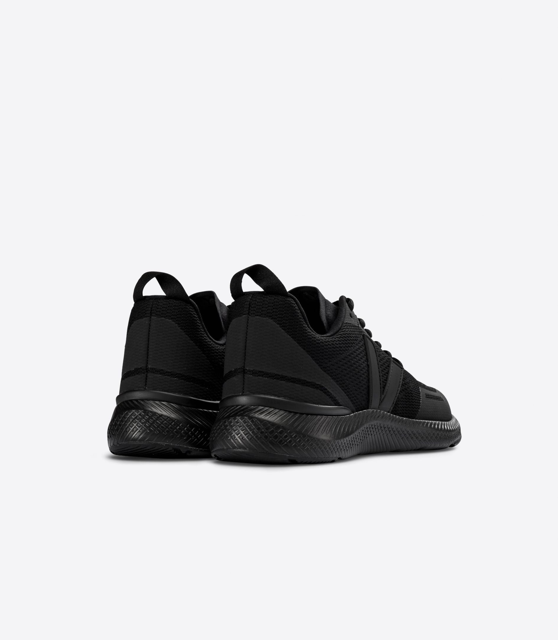 Back angle view of a pair of Women's Impala's by VEJA in all black
