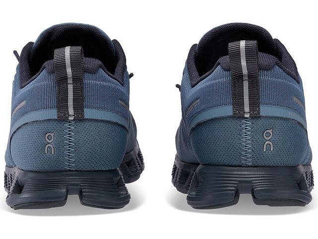 Back view of the Men's ON Cloud 5 waterproof shoe in the color Metal / Navy