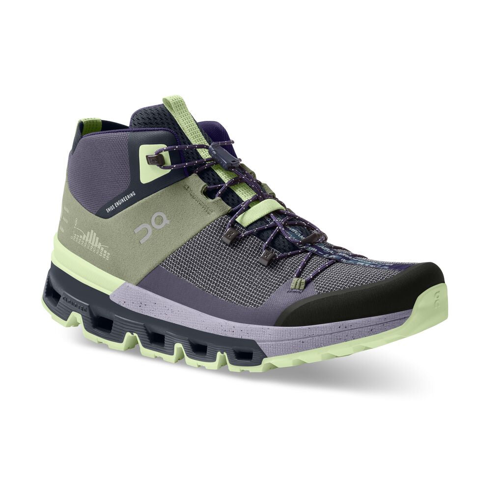 Front angle view of the Women's Cloudtrax hiking boot by ON in the color Reseda/Lavendar
