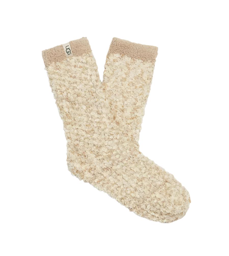 These dreamy, super-soft Ugg Cozy Chenille socks are perfect for lounging around the house all year long. Knit with a confetti-like pattern, you can wear them in place of slippers, or with your favorite sheepskin boots.