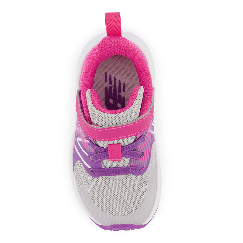 The bold Rave Run V2 kids’ running shoe from New Balance delivers plush comfort with a cool, youthful vibe. The mesh upper is lightweight and breathable, featuring a no-sew tip for durability and no-sew saddle for midfoot support.