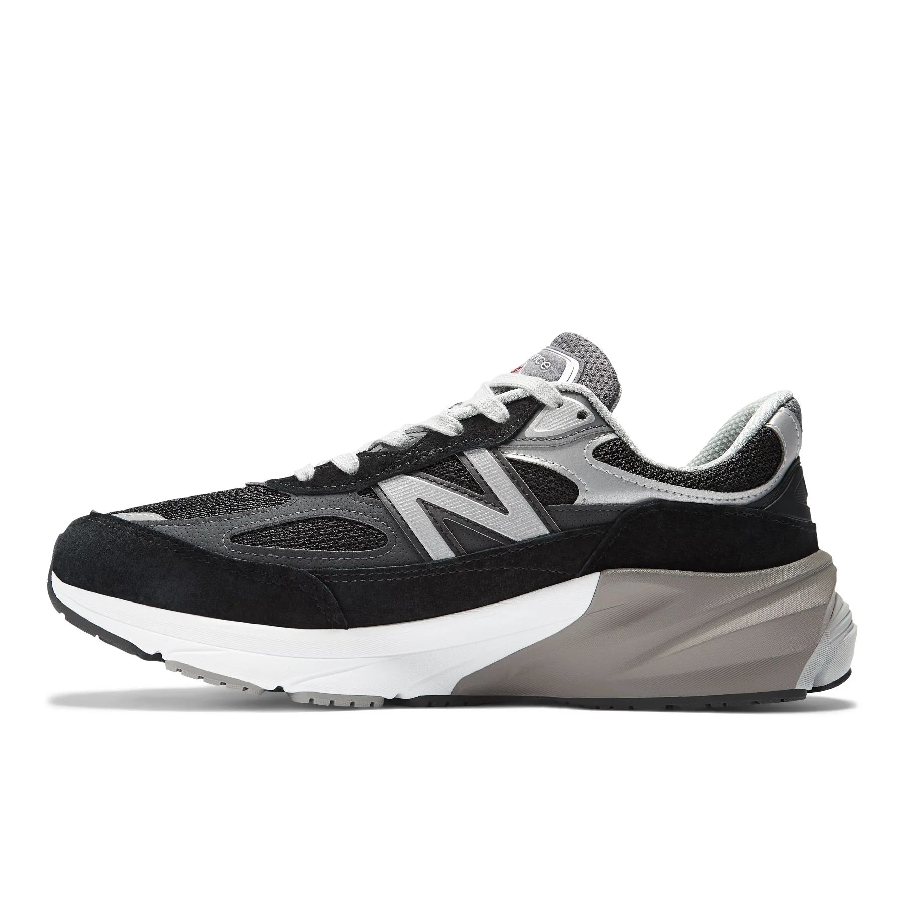 Medial view of the Men's New Balance 990 V6 lifestyle shoe in the color Black/White