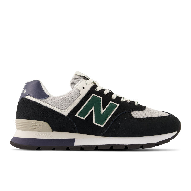 Lateral view of the New Balance 574 in the color Black/Blue/Green