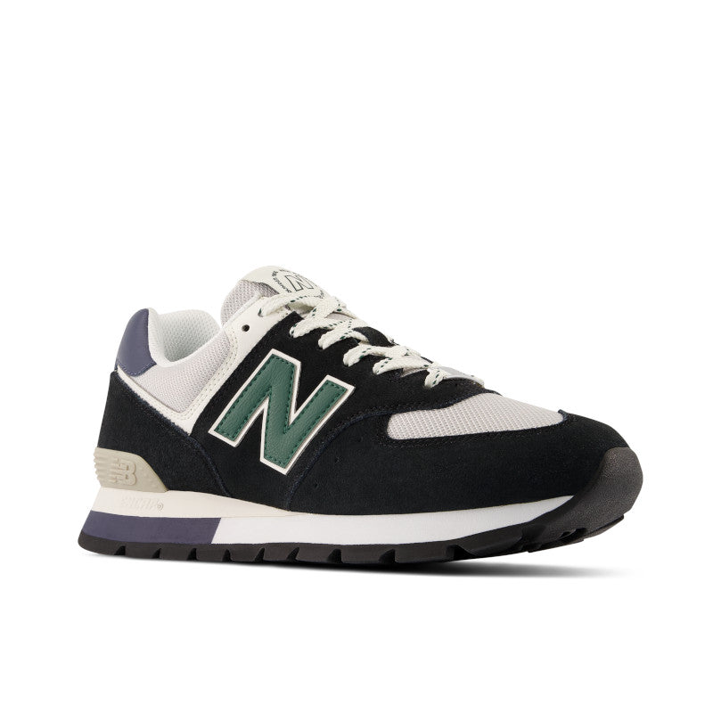 Front angle view of the New Balance 574 in the color Black/Blue/Green