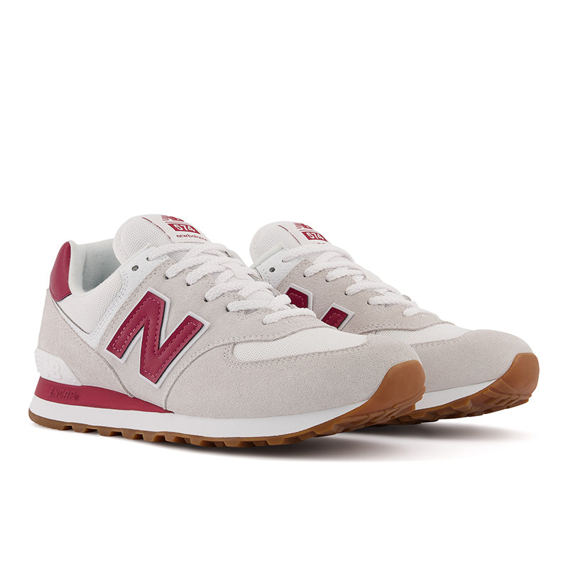 Front angle view of the Men's New Balance 574 in Off White/Red