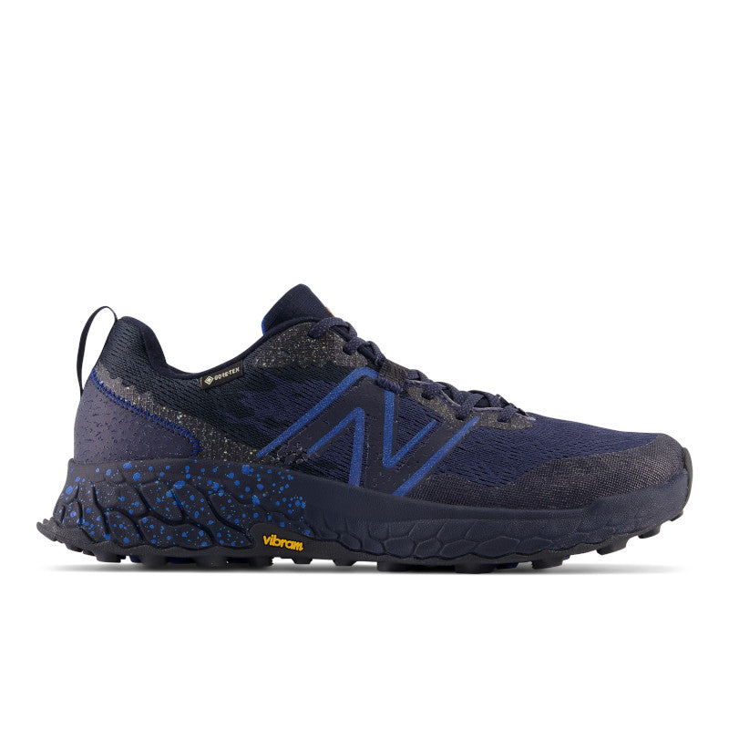 Lateral view of the Men's Hierro V7 Gortex trail shoe by New Balance in the color Eclipse/Natural Indigo