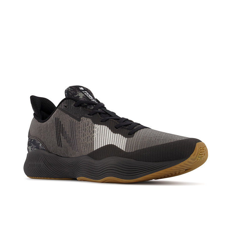Front angle view of the Men's FuelCell Shift TR by New Balance in the color Black/Gum