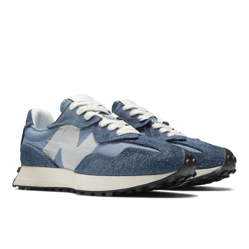 Front angled view of the Men's New Balance 327 in the color Vintage Indigo