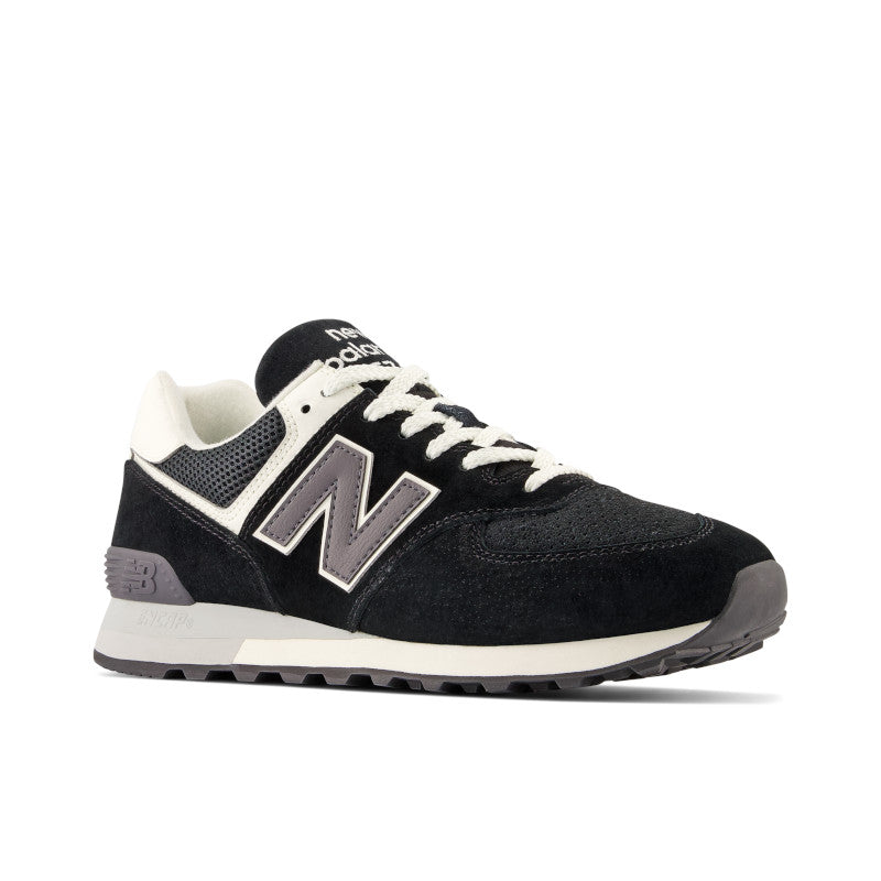 Front angle view of the Men's 574 Lifestyle shoe by New Balance in Black/Grey