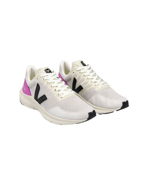 Named after one of the fastest and most athletic fishes in the ocean, the Women's Marlin from Veja is designed for those days when you have performance in mind. Light and dynamic yet comfortable for everyday users. The Marlin is about perpetual improvement in mind.  The V-knit is a textile technic bringing elasticity and adaptability to the foot. It is constructed in one piece to reduce layering and stitches on the sneaker. This material is light and comfortable.