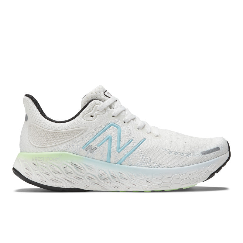 Lateral view of the Women's New Balance 1080 V12 in the color White/Bleach Blue/Green Aura