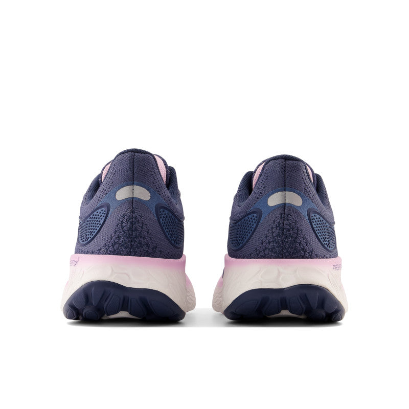 Back view of the Women's 1080 V12 by New Balance in the color Vintage / Indigo