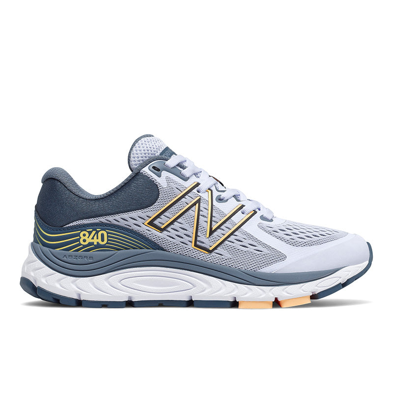 Lateral view of the Women's 840 V5 by New Balance in the color Silent grey / Light mango