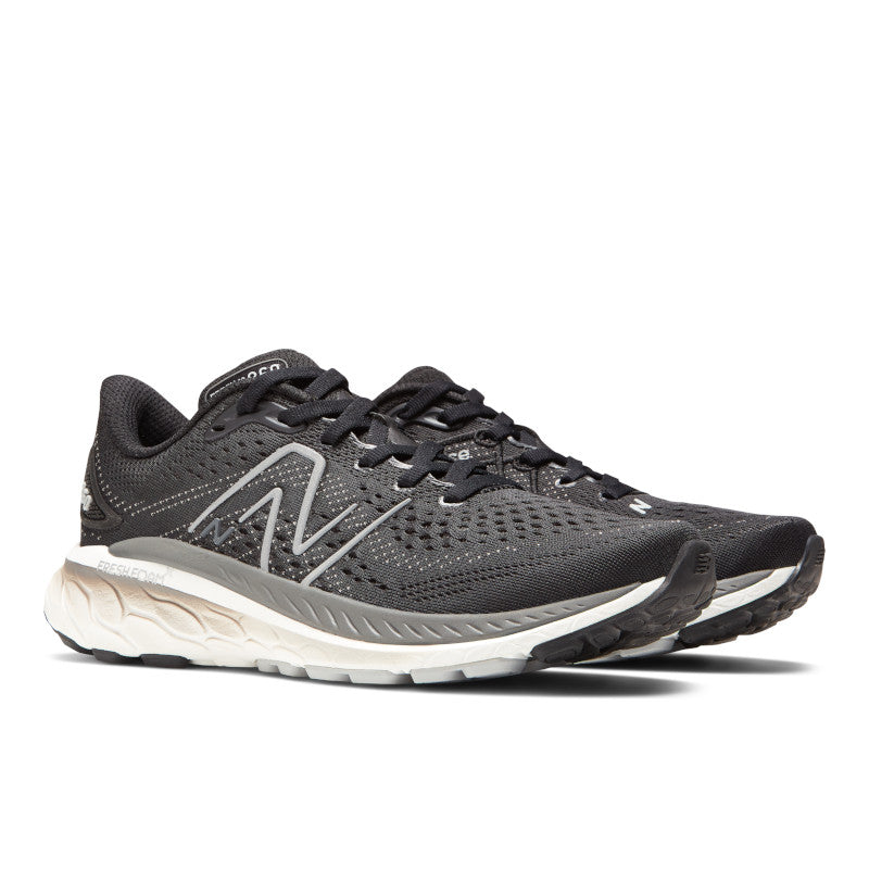Front angle view of the Women's New Balance 860 V13 in the color Black/White/Castlerock
