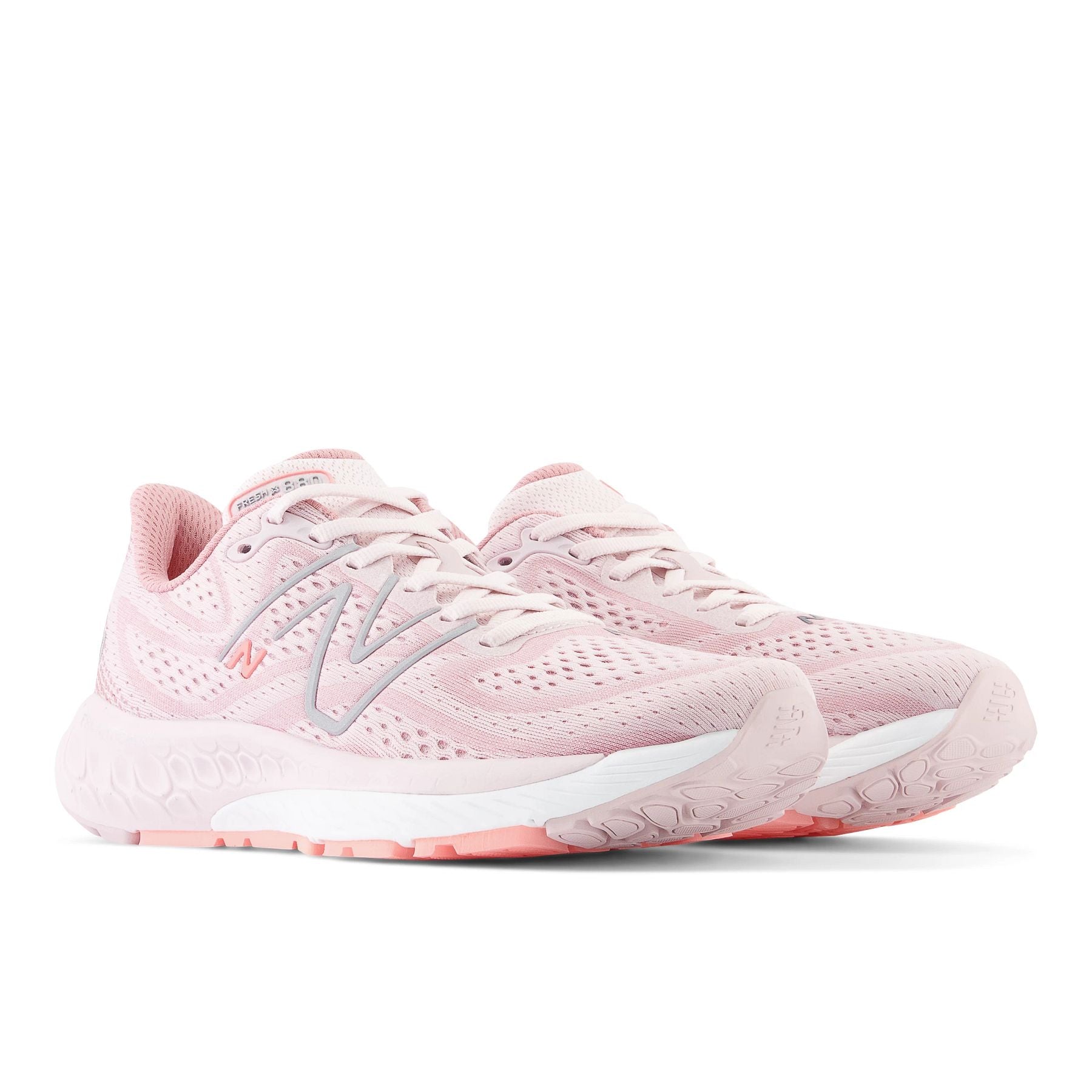 Front angle view of the Women's 880 V13 by New Balance in the color Stone/Pink