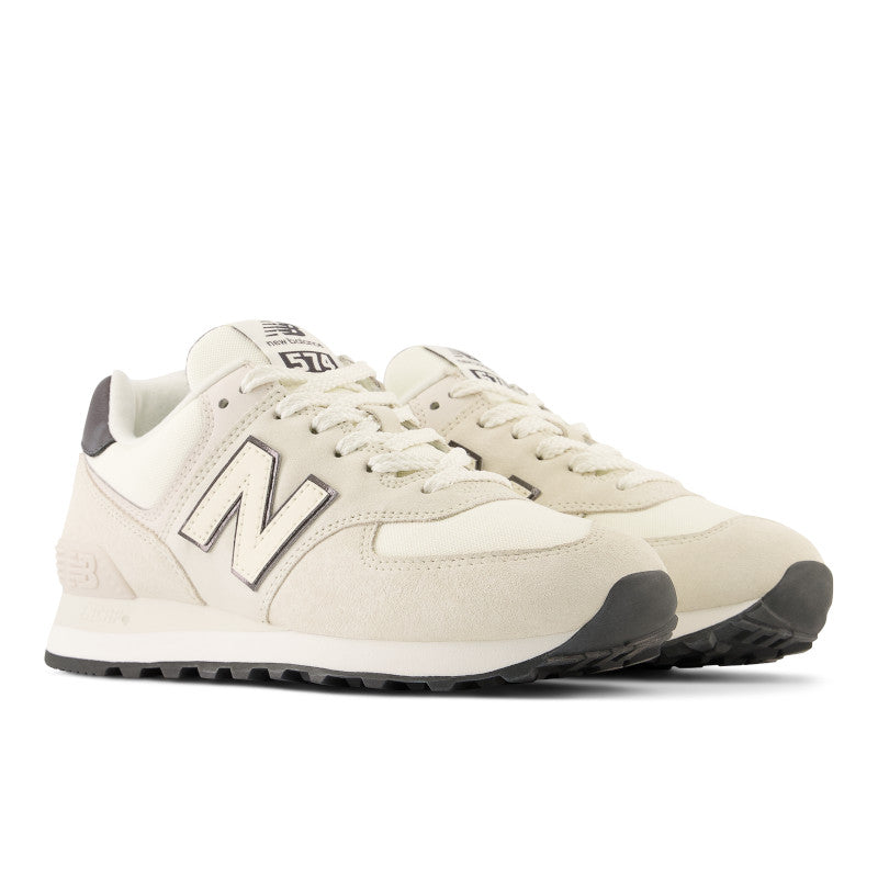 Front angle view of the Women's New Balance 574 in the color Angora White